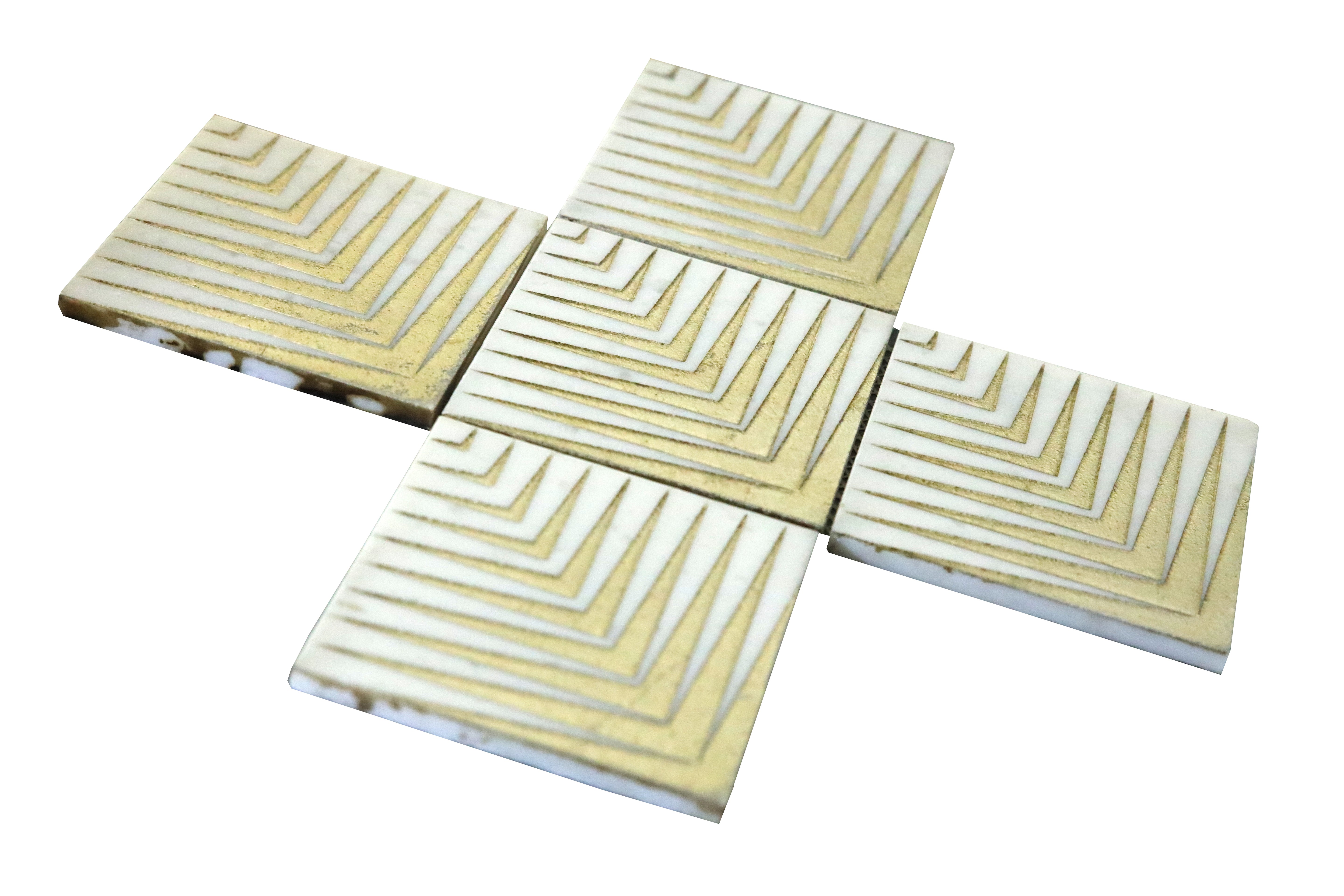 Close-up of Agape White marble mosaic tile with gold geometric detailing