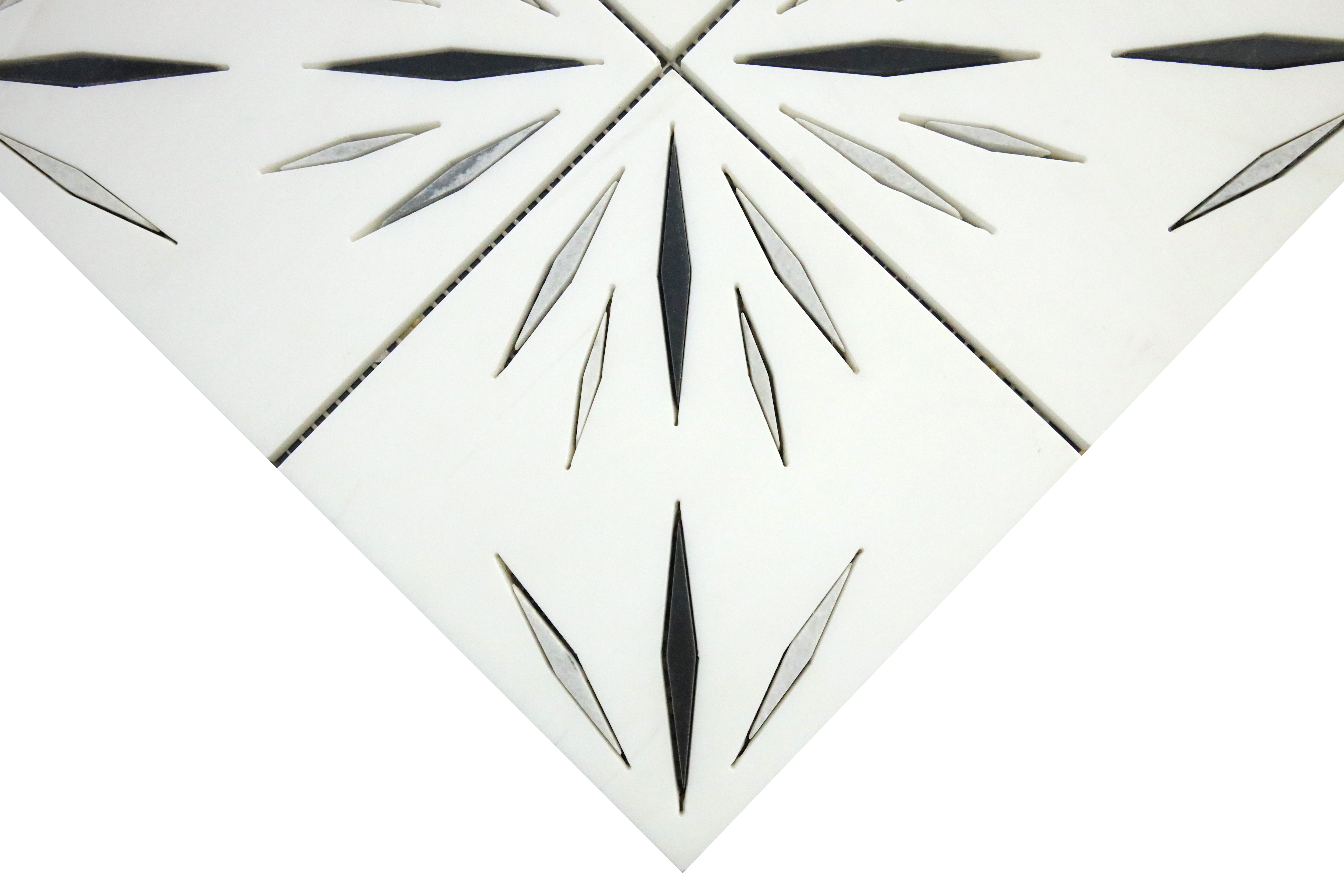 Close-up of white grey and black marble waterjet mosaic showing precise cuts
